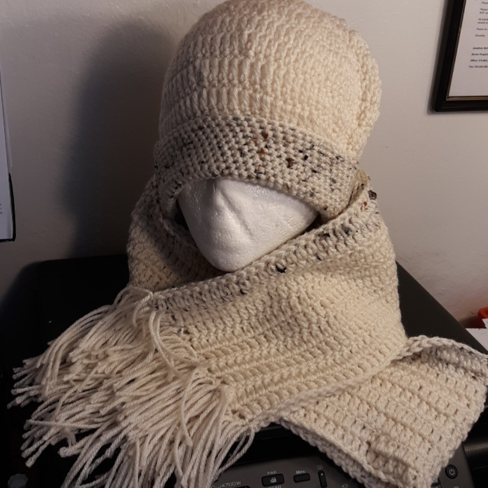 Hand crocheted hat and scarf.